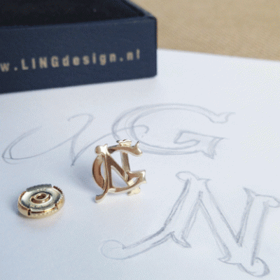 14 krt geel gouden reversspeld van initialen